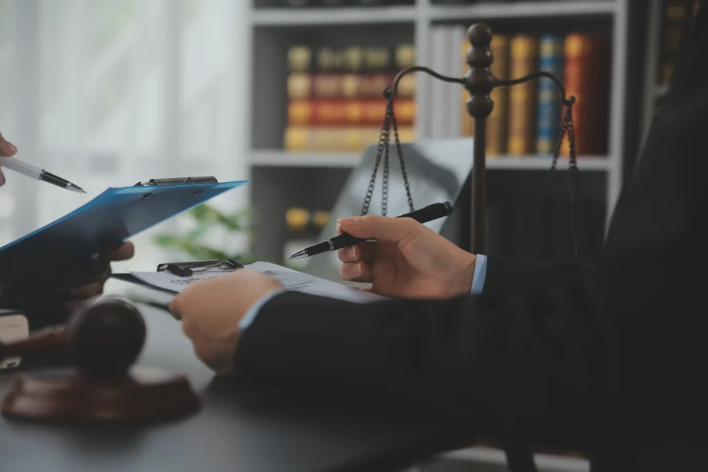 Professional lawyer consulting client in Hobart law firm office