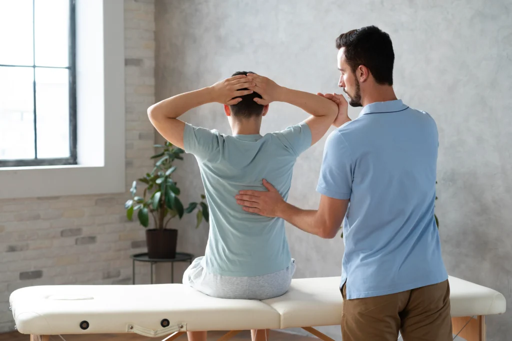 Chiropractic patient consultation and treatment in Brisbane clinic