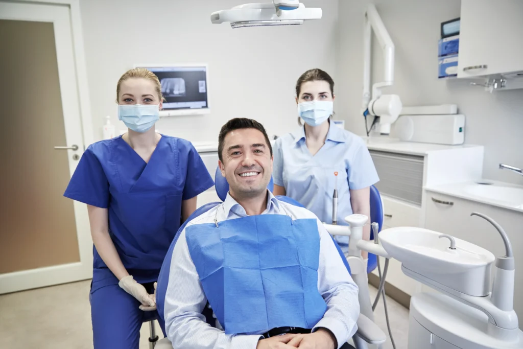 Dentist providing treatment to patient in Hobart dental clinic