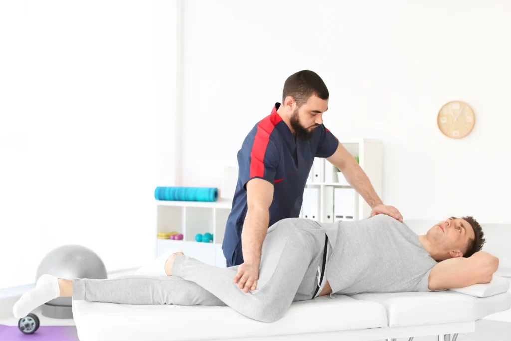 Chiropractic patient consultation and therapy session in Melbourne clinic