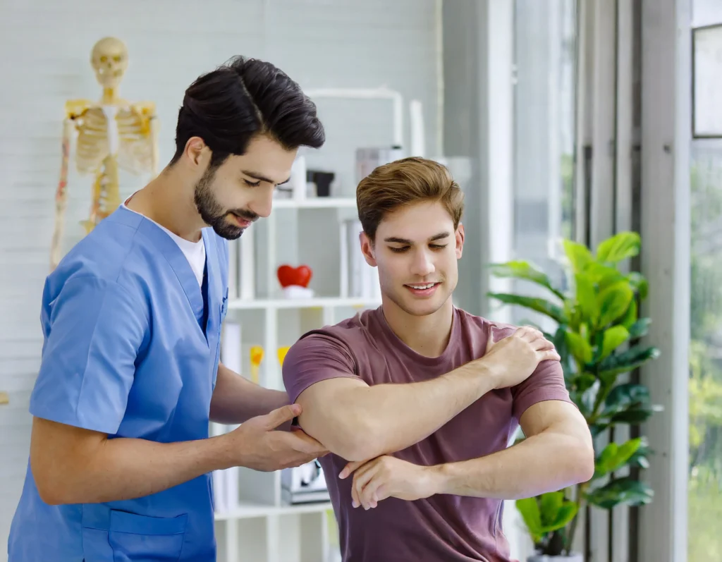 Physiotherapist providing physical therapy treatment in Perth clinic