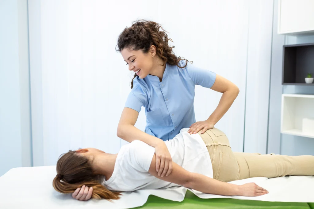 Chiropractor providing spinal adjustment treatment in Melbourne clinic