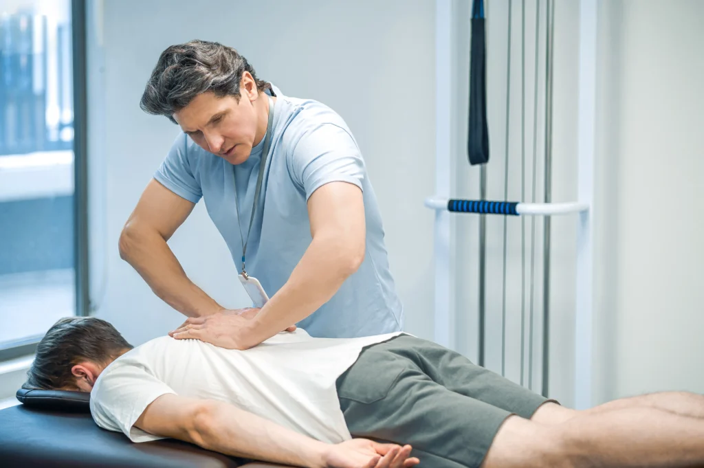 chiropractor in Perth treating patient PPC advertising for chiropractic clinics