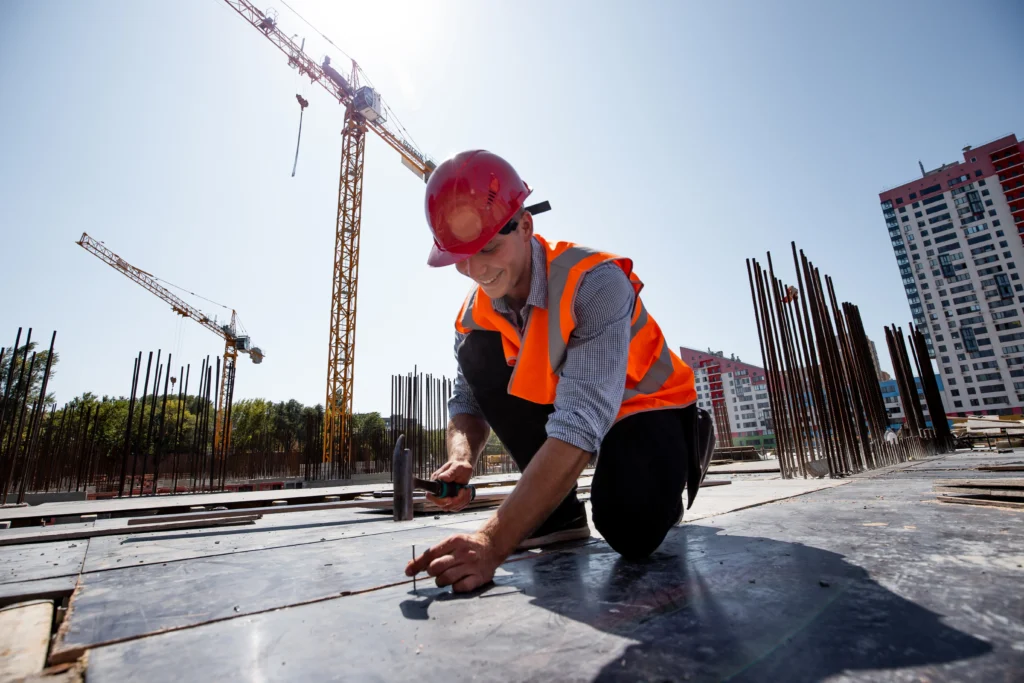 Professional builder working on construction site in Perth residential project