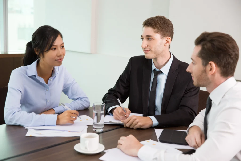 lawyer in Brisbane office with branded business card and brochure graphic design for law firms