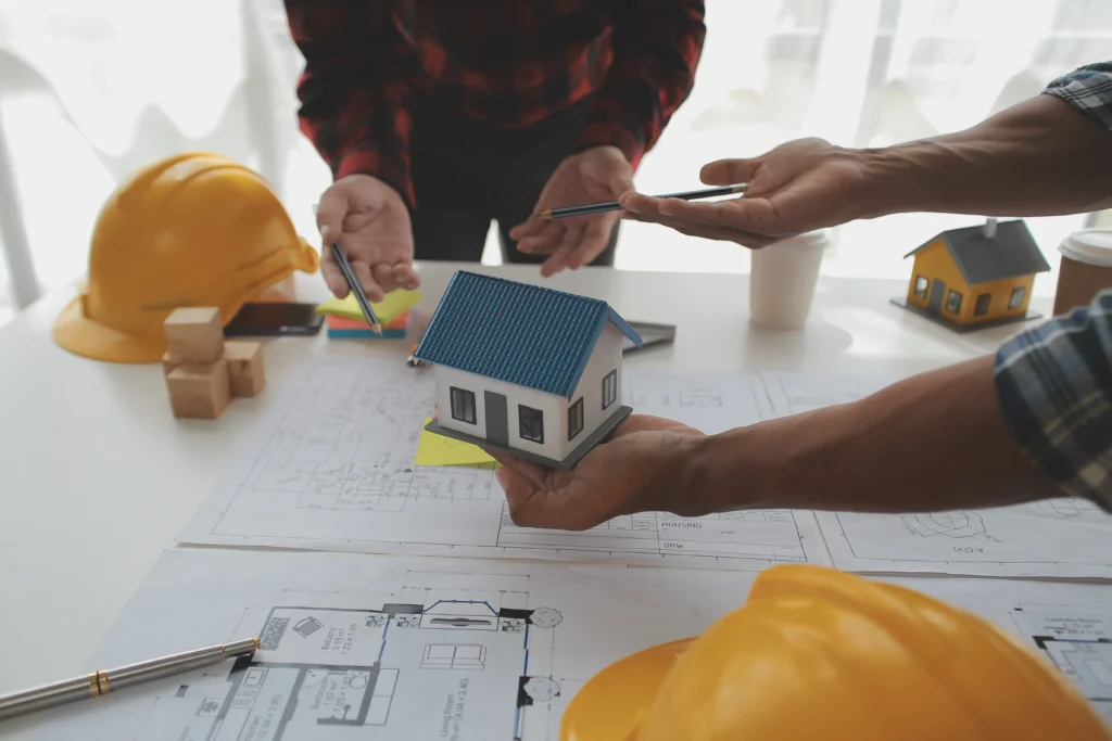 builder in Brisbane discussing construction plans PPC advertising for builders