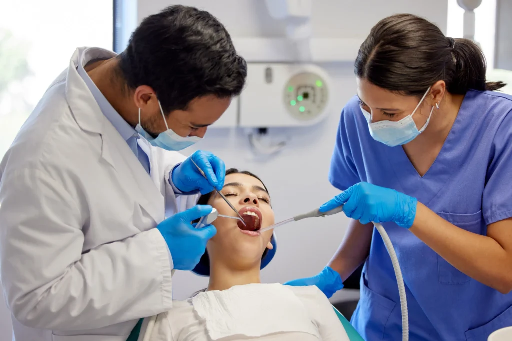 dentist in Adelaide clinic consulting patient PPC advertising for dental practices