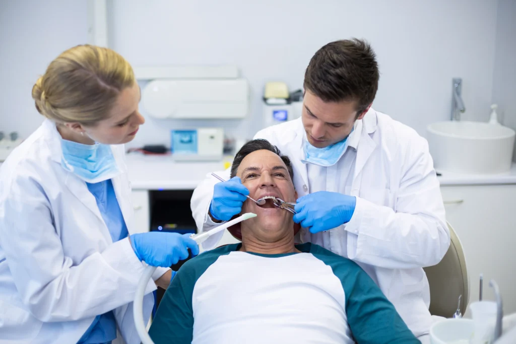 dentist in Sydney clinic consulting patient PPC advertising for dental practices