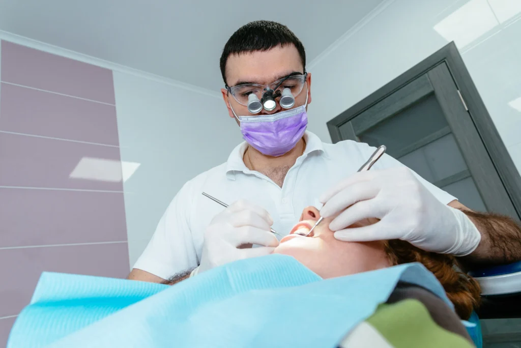 dentist in Melbourne clinic consulting patient PPC advertising for dental practices
