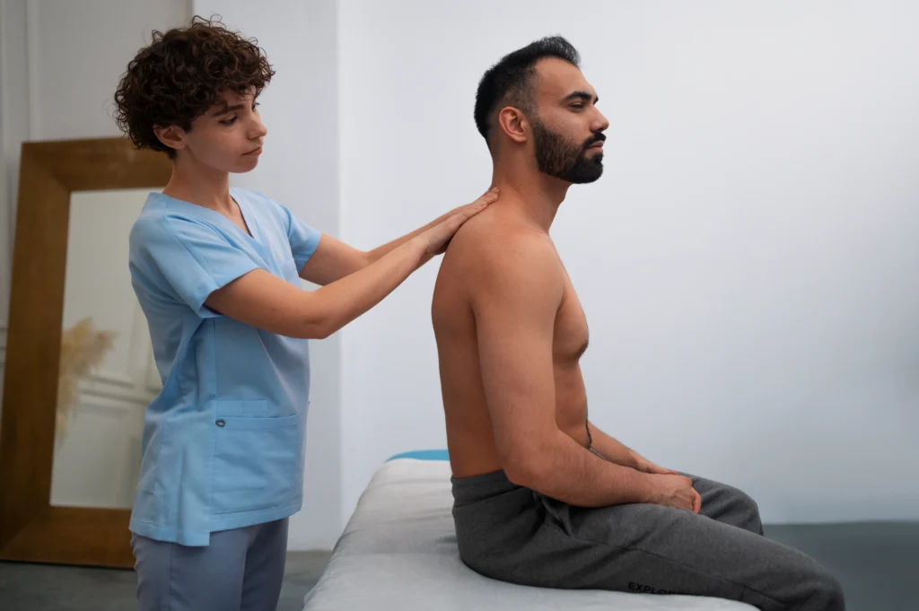 chiropractor in Perth clinic with branded brochure and business card graphic design for chiropractic clinics