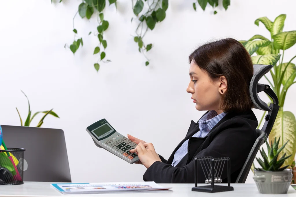accountant in Brisbane office with branded business card and brochure graphic design for accounting firms