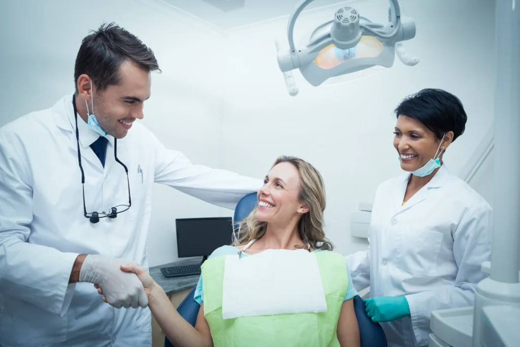 dentist in Brisbane clinic using mobile app for patient booking app development for dental practices