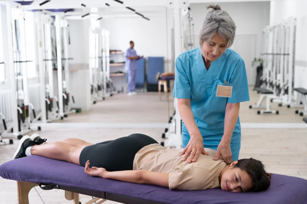 chiropractor in Brisbane clinic with branded brochure and business card graphic design for chiropractic clinics