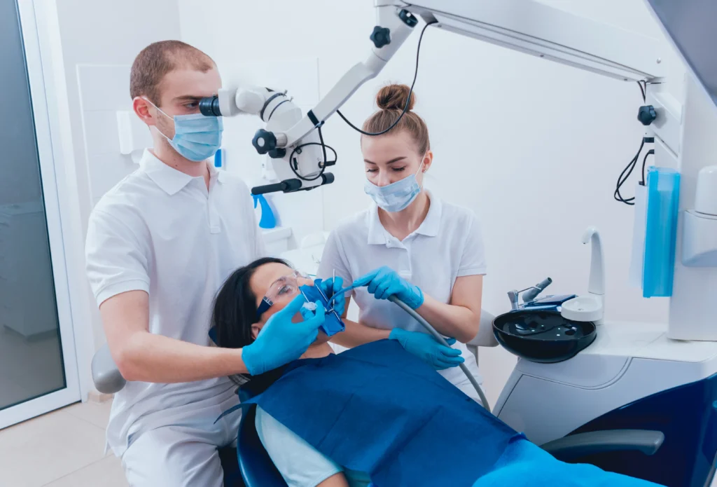 dentist in Perth clinic consulting patient PPC advertising for dental practices