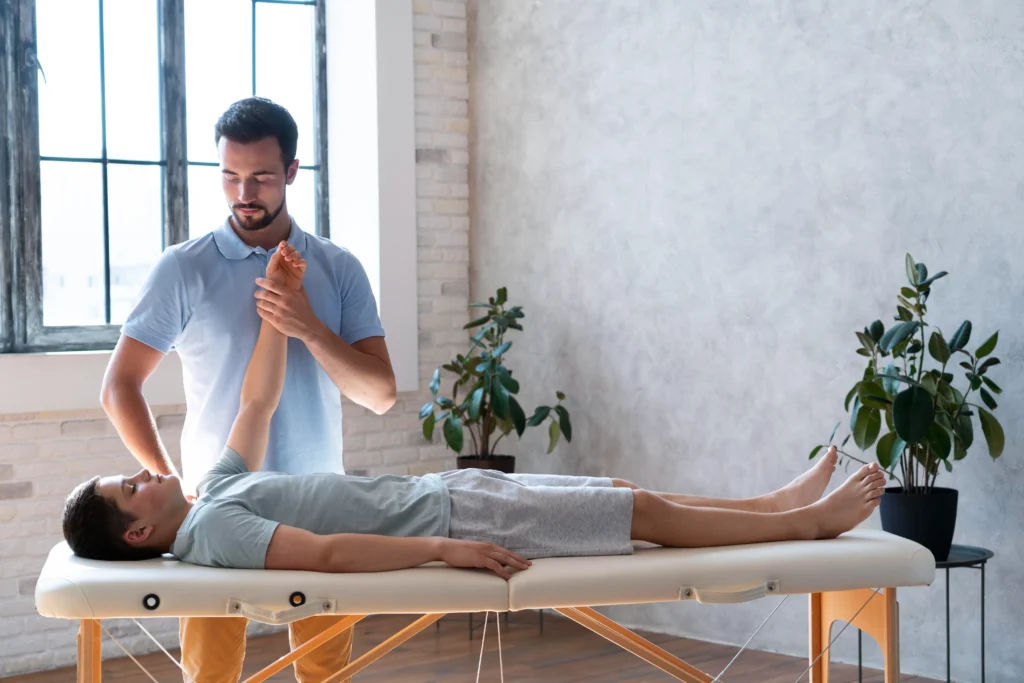 chiropractor in Brisbane treating patient PPC advertising for chiropractic clinics