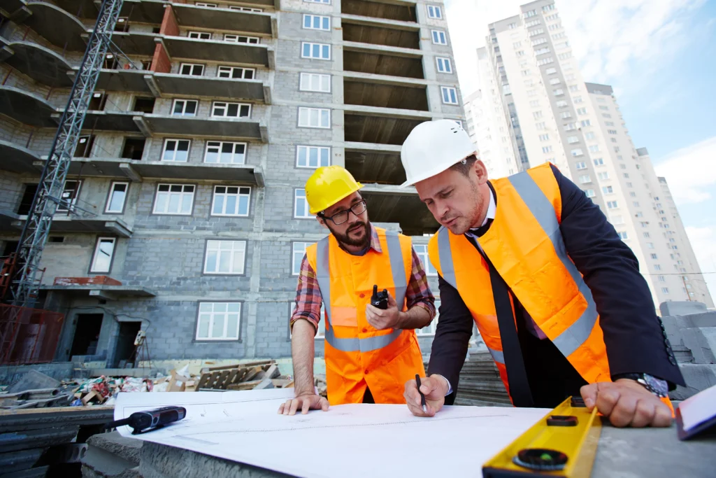 builder in Melbourne with branded uniform and construction company brochure graphic design for builders
