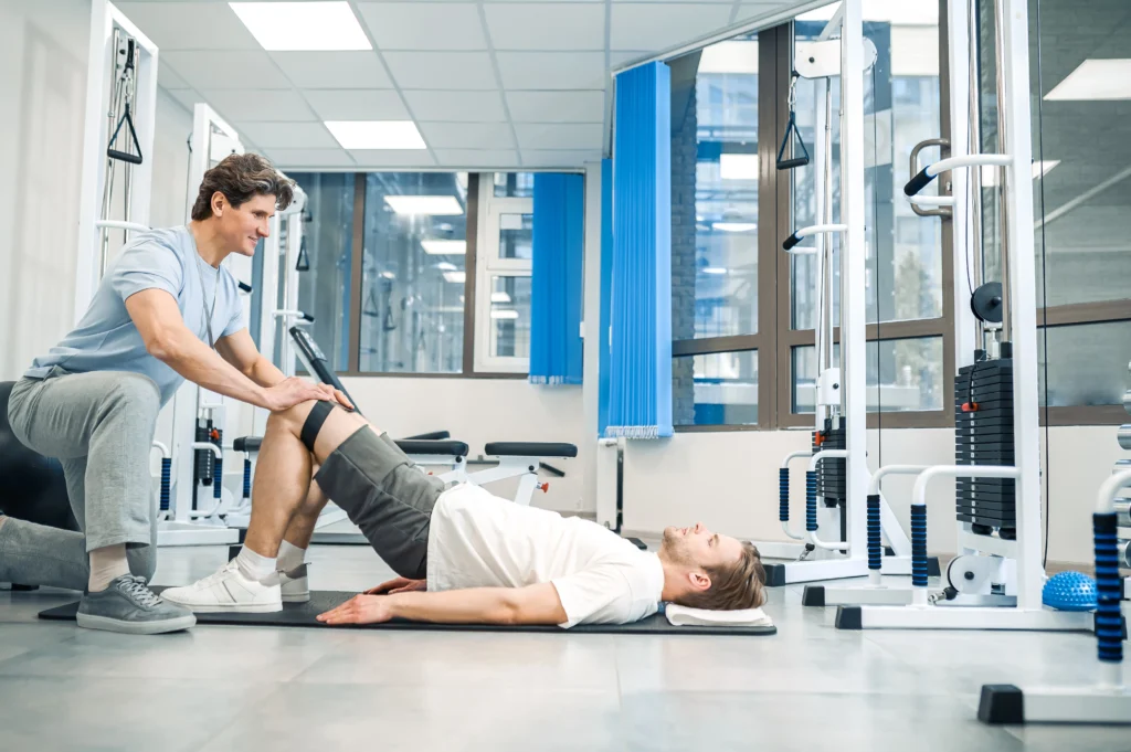 chiropractor in Hobart clinic with branded brochure and business card graphic design for chiropractic clinics