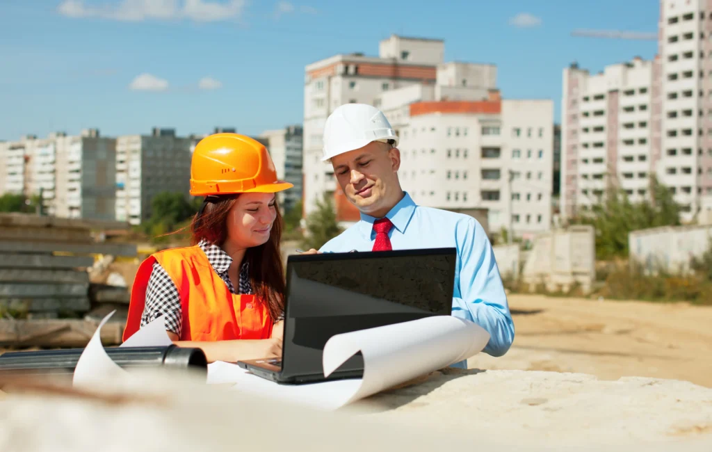 builder in Brisbane with branded uniform and construction company brochure graphic design for builders