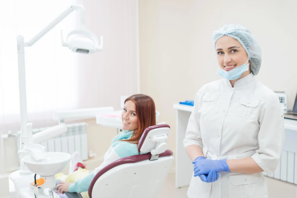 dentist in Hobart clinic with branded marketing materials graphic design for dental practices